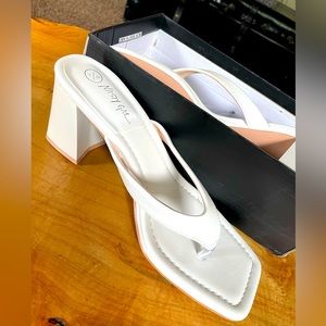 Brand-new white block heel thong sandals from Nasty Gal